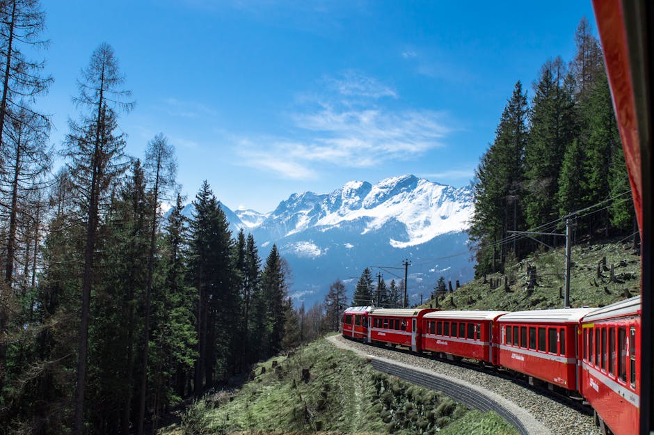 Traveller aboard a European train enjoying landscapes